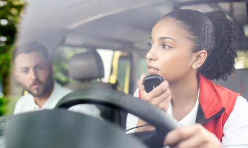 female EMT receiving a call